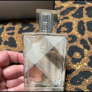 Burberry brit for her. Used a few times